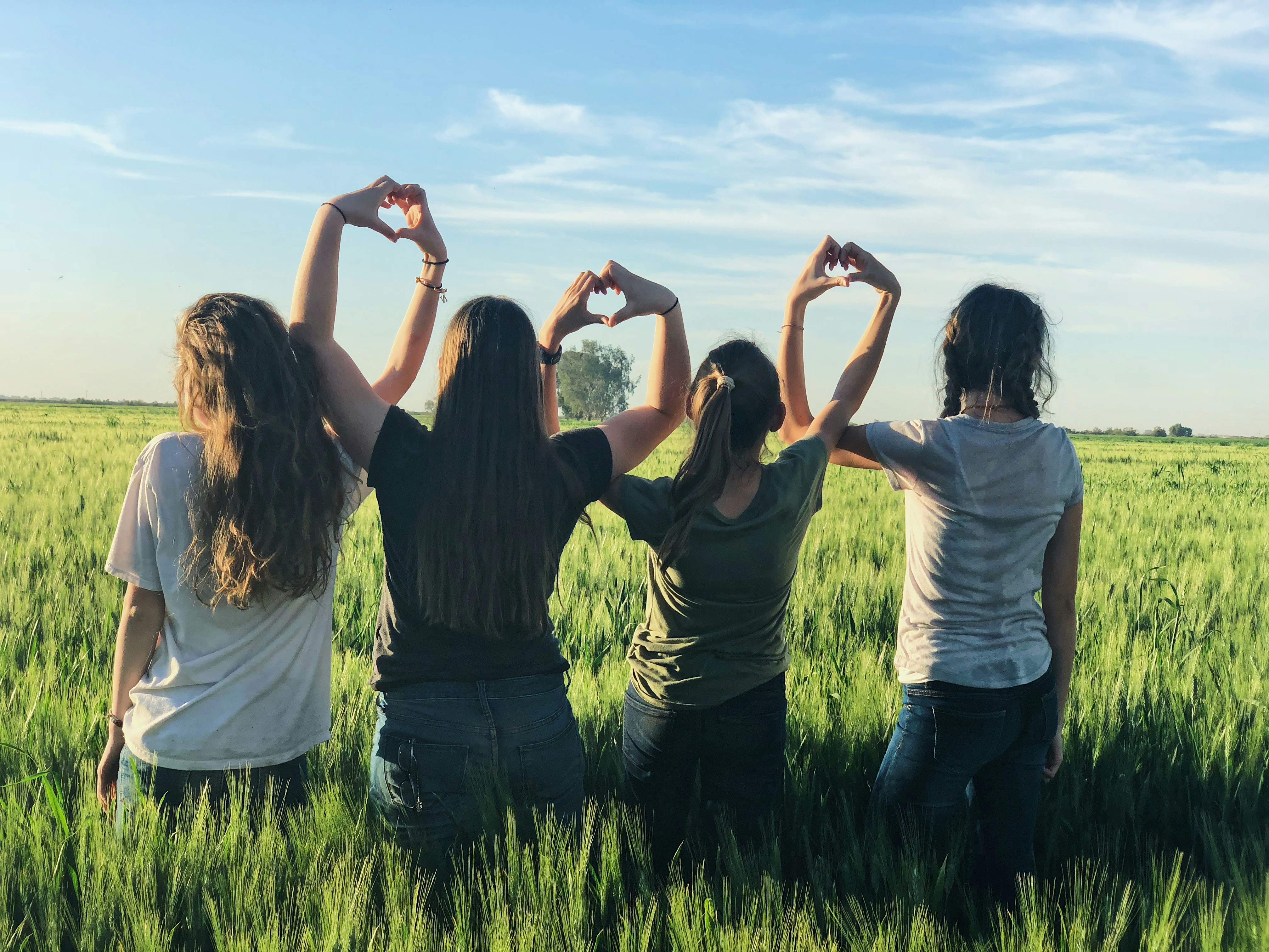 Women enjoying sunset at beach